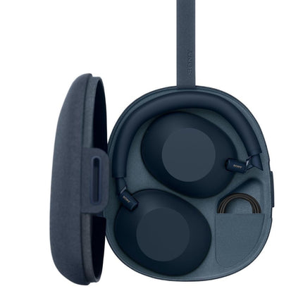 Sony WH-1000XM6, midnight blue, folded in open carry case