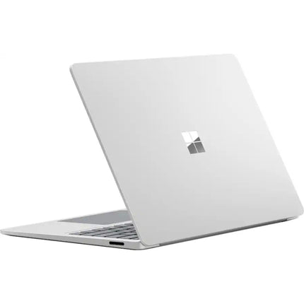 Microsoft Surface Laptop 7, platinum silver, closed lid rear angled view