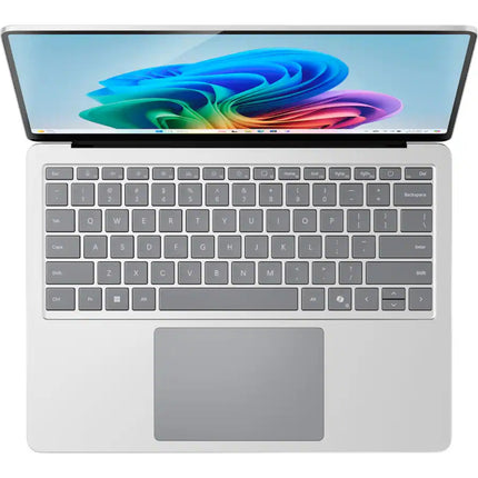 Microsoft Surface Laptop 7, platinum silver, open top-down keyboard view