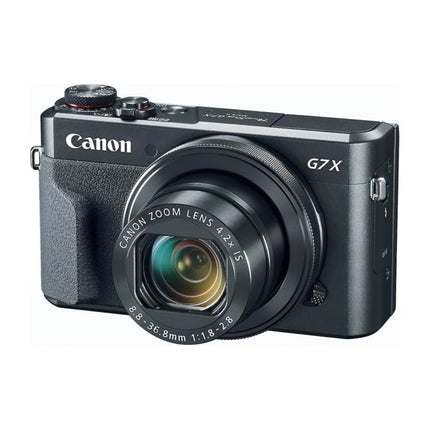 Canon PowerShot G7 X Mark II, black, front angled view showing lens and controls