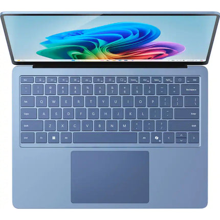 Microsoft Surface Laptop 7, sapphire blue, open top-down keyboard view