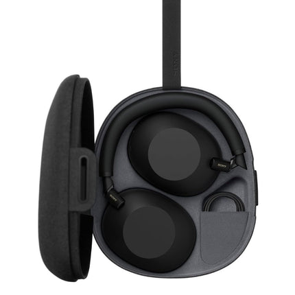 Sony WH-1000XM6, black, folded flat view in open carry case
