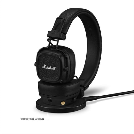 Marshall Major V Wireless On-Ear Headphones, black, front view on wireless charging stand