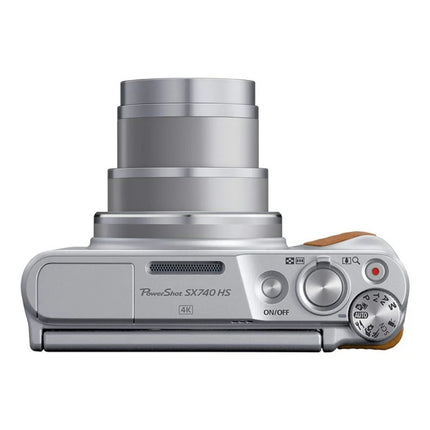 Canon PowerShot SX740 HS, silver, front angled 3/4 view showing top and lens