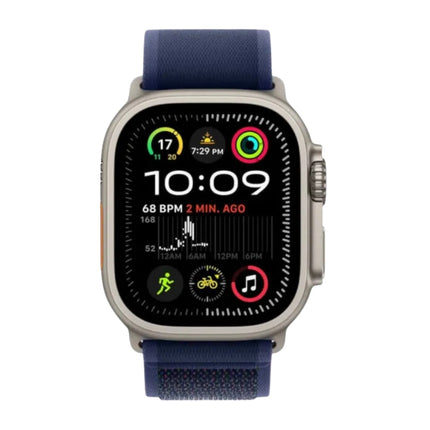 Apple Watch Ultra 3 49mm, natural titanium with navy trail loop, front display alternate face