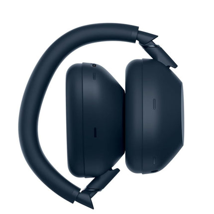 Sony WH-1000XM6, midnight blue, rear angled view with earcups folded