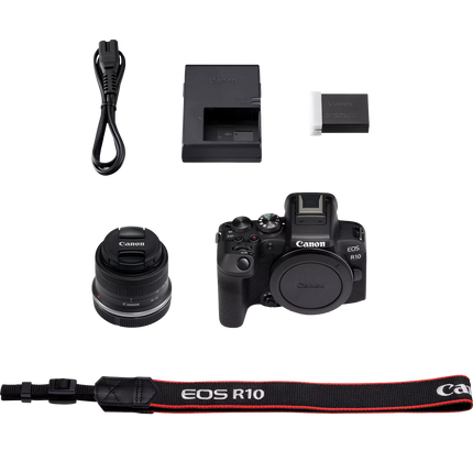 Canon EOS R10, black, box contents flat lay with camera and accessories
