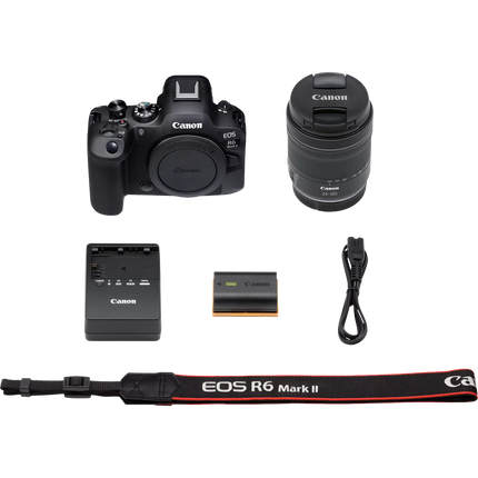Canon EOS R6 Mark II, black, box contents flat-lay with camera, lens, charger, strap