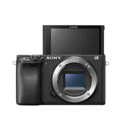 Sony Alpha 6400K, black, front view body only, sensor visible, angled