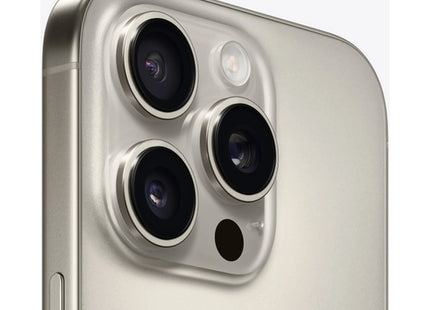 Apple iPhone 16 Pro in Natural Titanium, angled close-up of triple-camera module