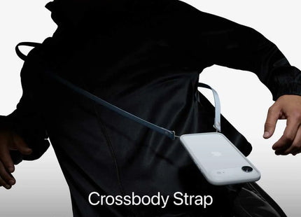 Apple iPhone Air, space black, lifestyle shot with crossbody strap accessory